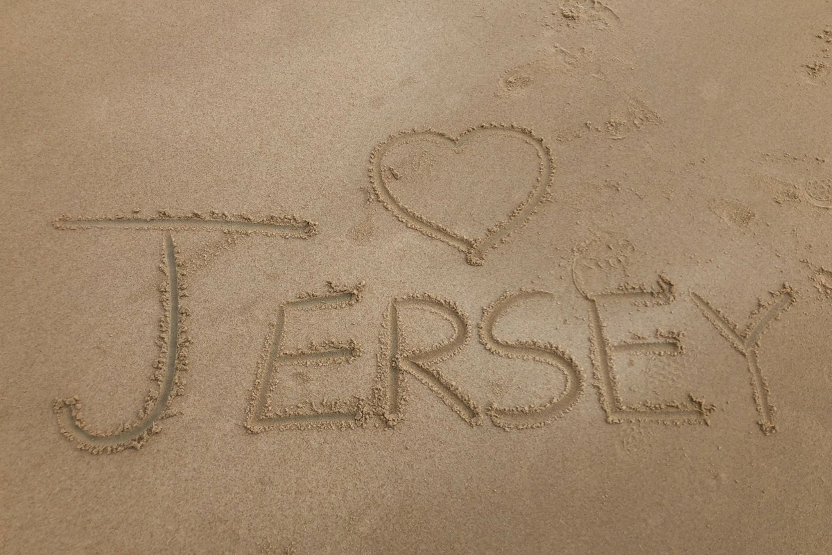 Jersey written in sand