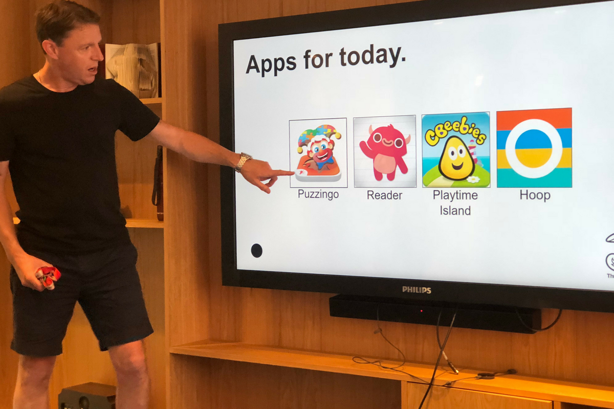 Three Discovery Staff showing child friendly apps