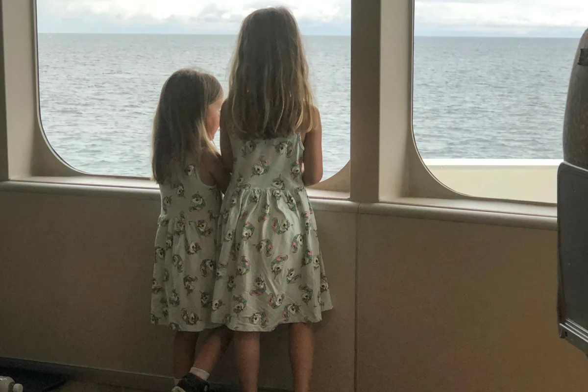 Kids looking out of Condor Ferry