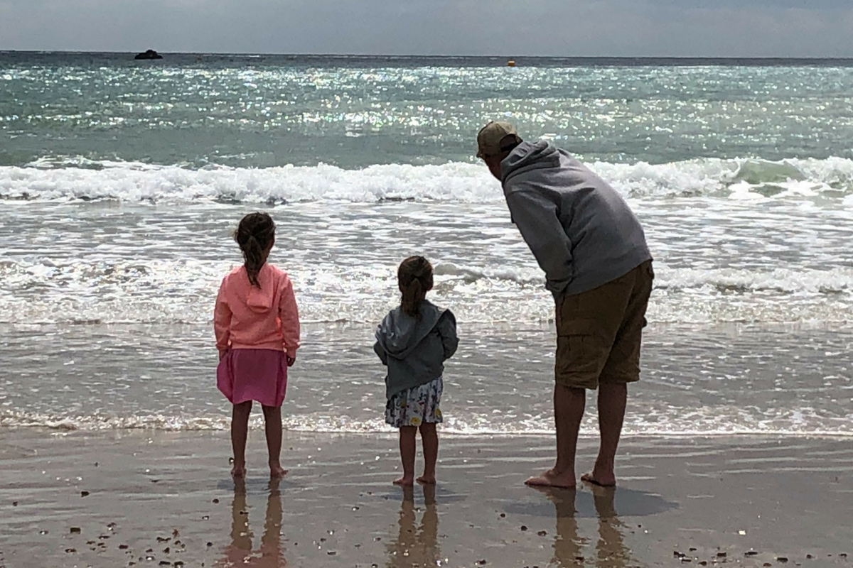 Matt and kids on the beach