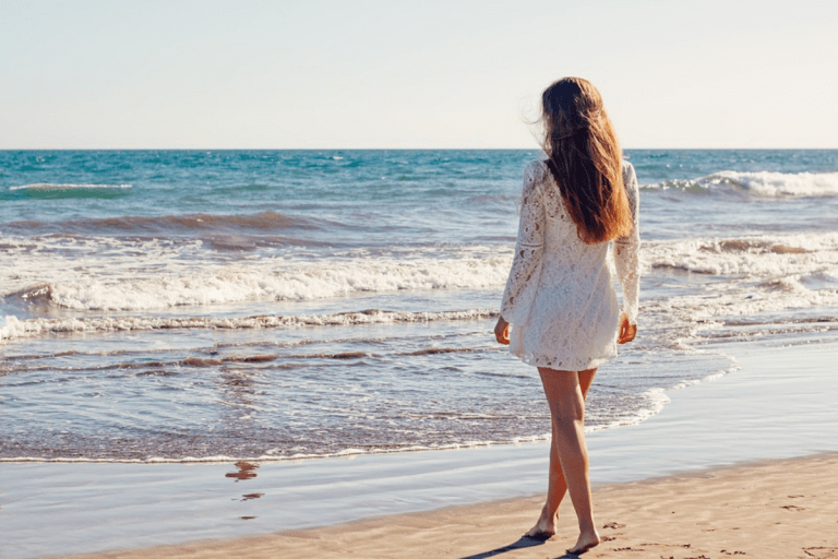 Woman walking at the beach