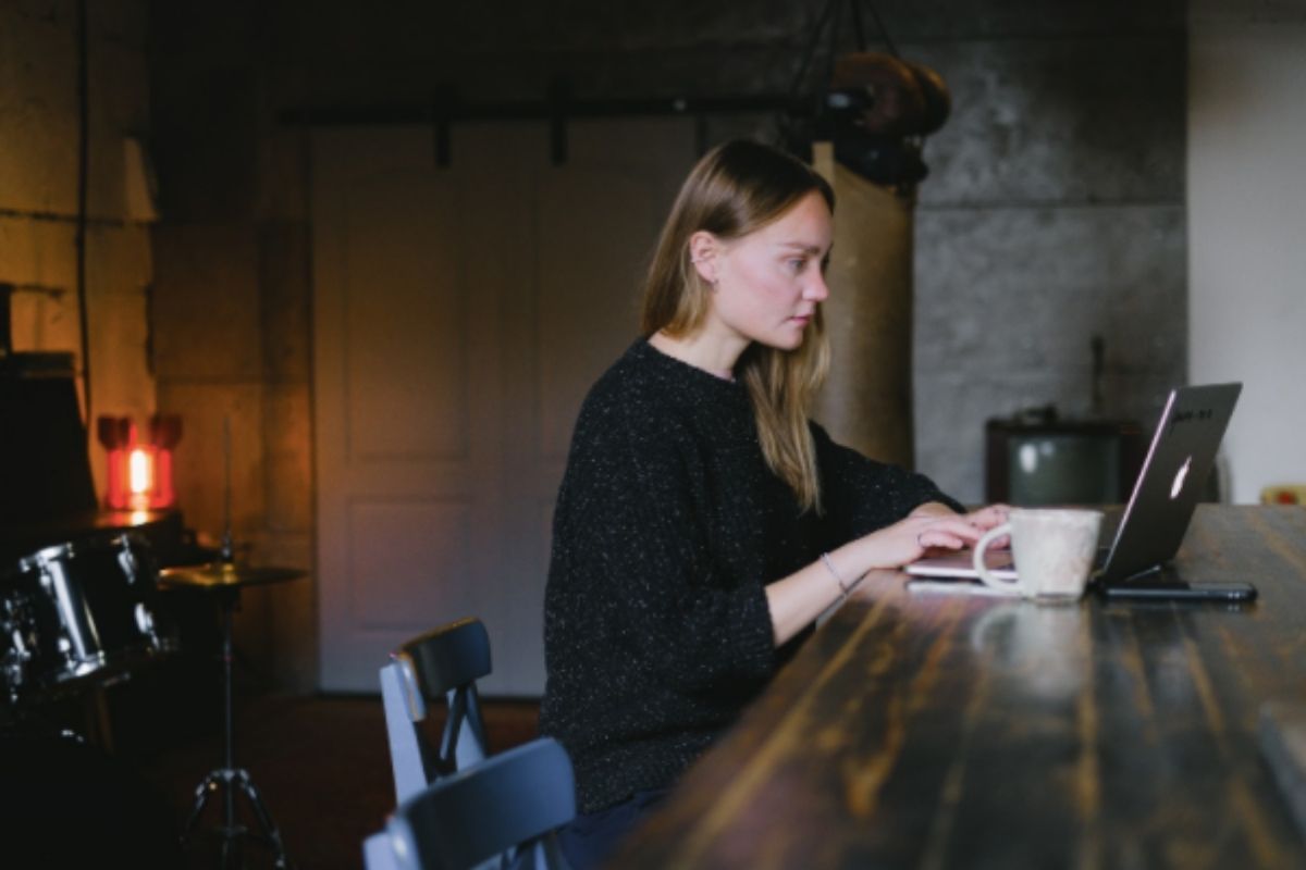 A lady sat at the desk