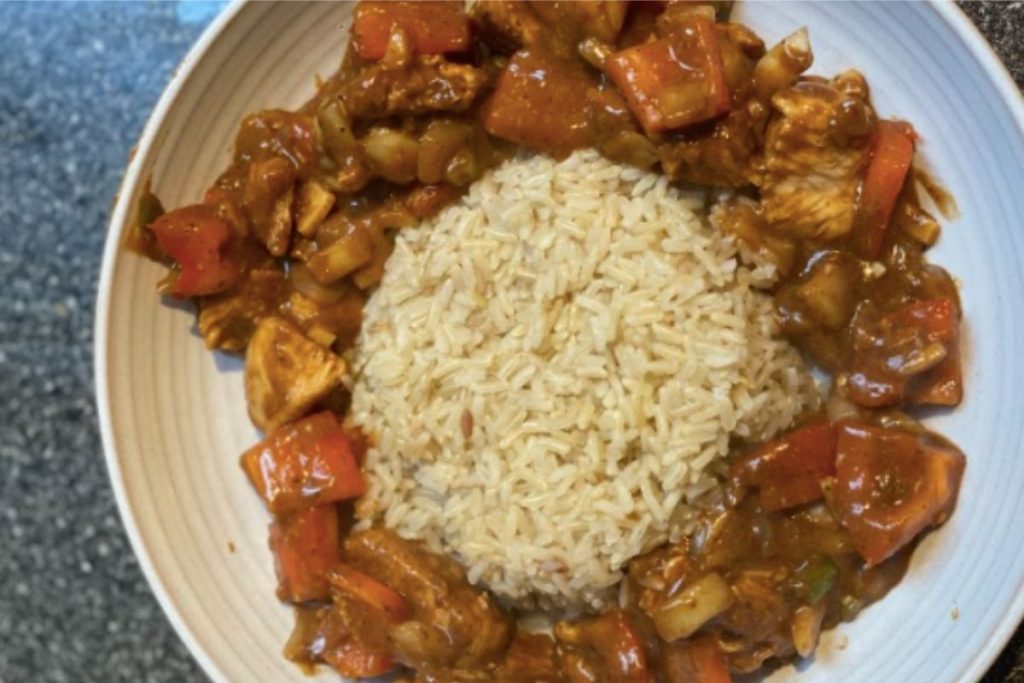 Firecracker chicken with rice in the middle