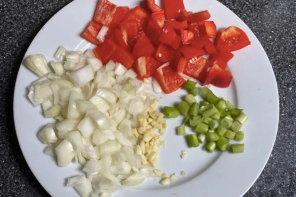 Onions, peppers and spring onions cut up