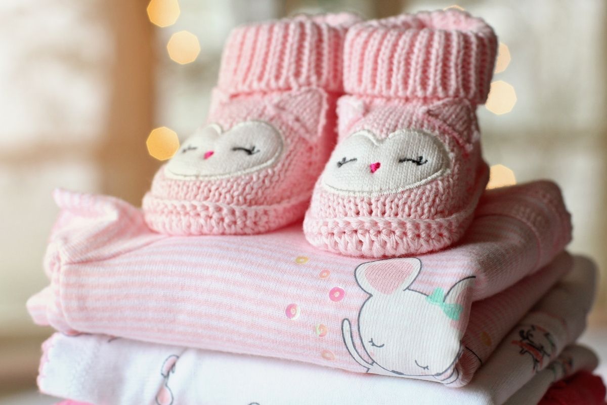 Blankets with pink booties on top