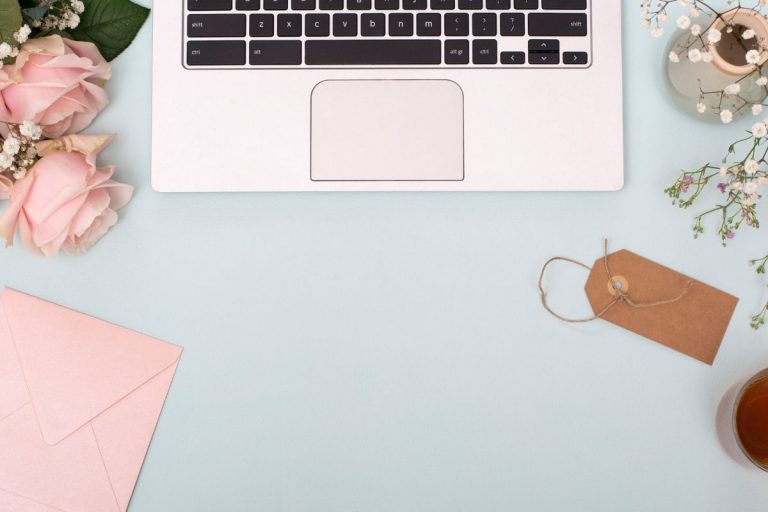 Grey background with mac on top