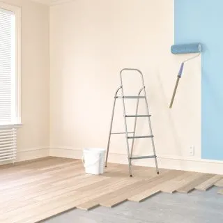 A white wall that is painted blue