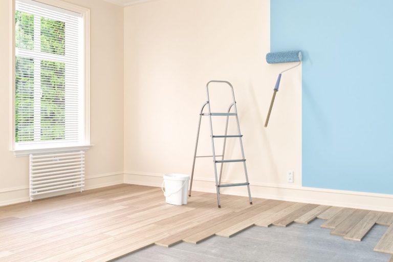 A white wall that is painted blue