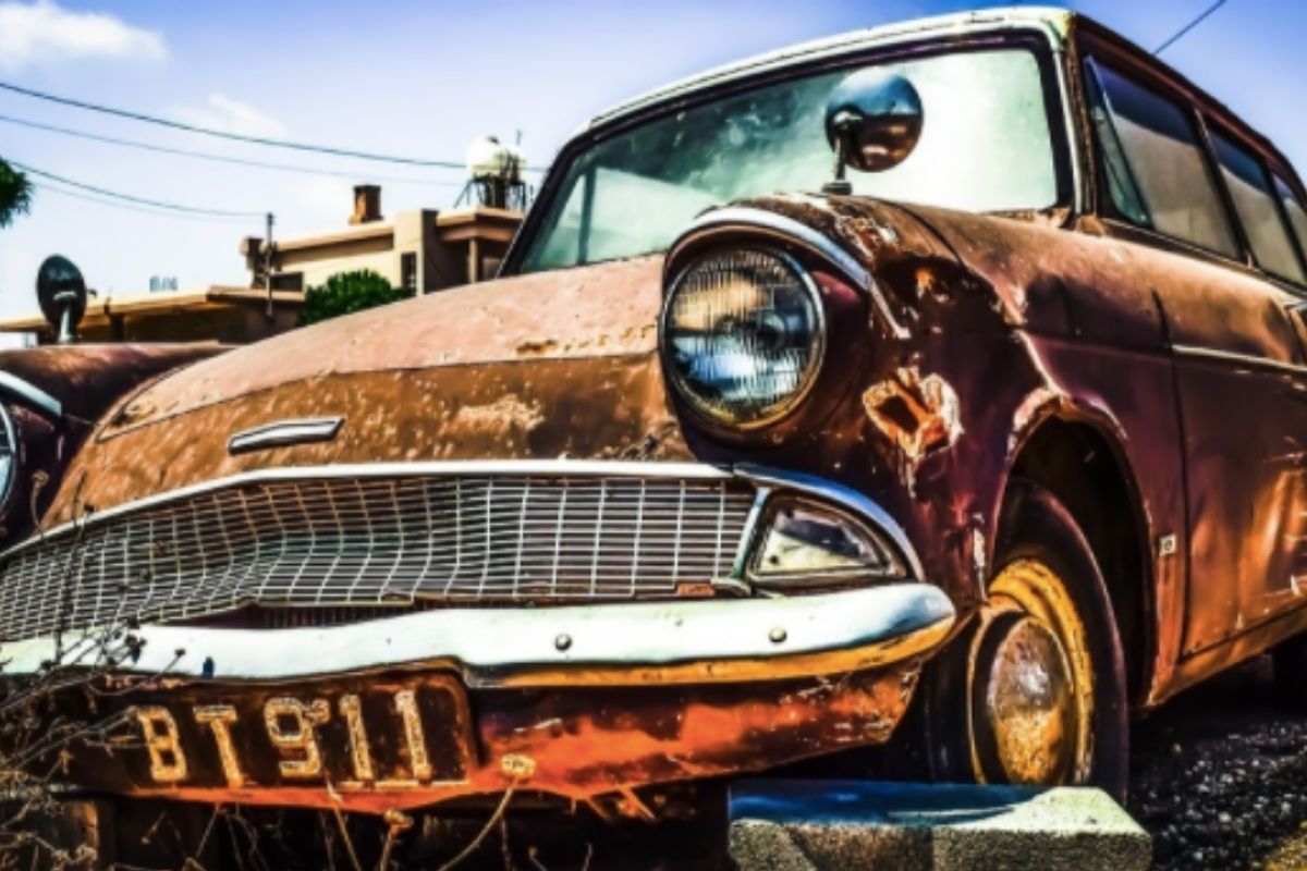 Golden car that looks rusty