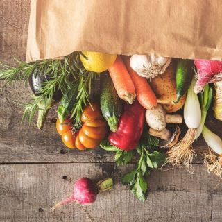 Brown paper bag with vegetables
